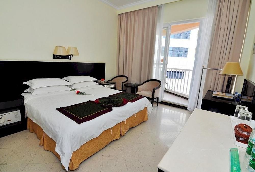 Sanya Jingwei Hotel - Санья Экстерьер фото